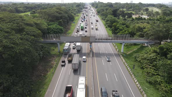 Aerial view of Indonesia Highway with busy traffic.