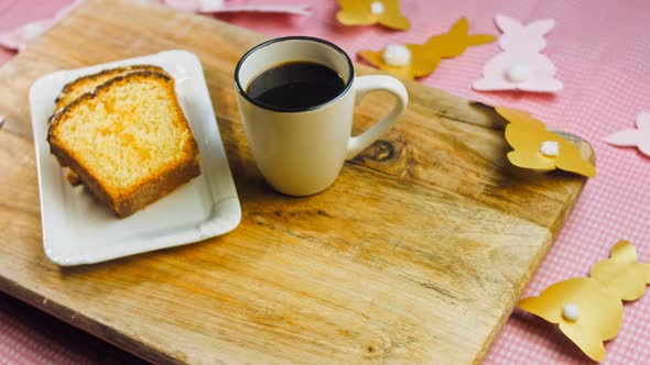 Cup of Coffee on the Table Where There is a Chocolate Cake