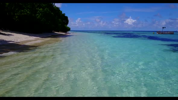 Aerial top view panorama of tropical lagoon beach lifestyle by shallow water and white sandy backgro