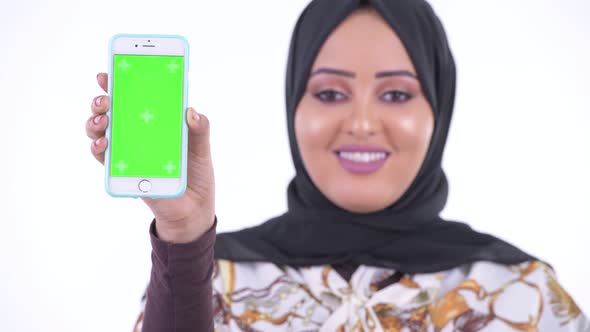 Face of Happy Young African Muslim Woman Showing Phone