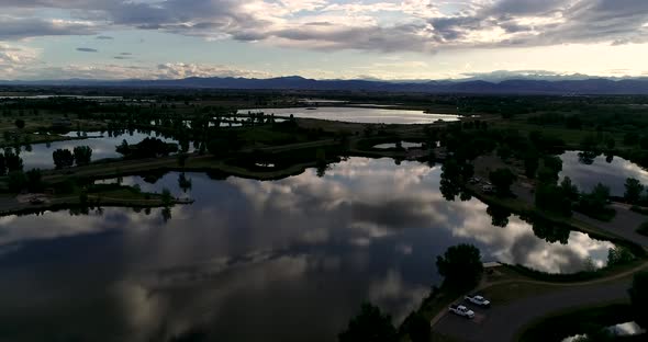Subtle light changes and reflections in this blissful drone shot of a Colorado Rocky Mountain Sunset