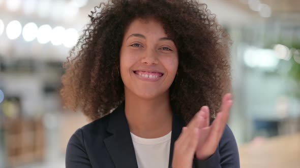 Excited Young African Businesswoman Clapping Applauding