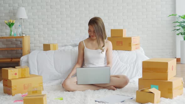 Businesswoman working with laptop for Online shopping at home