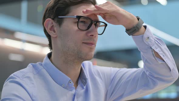 Close Up of Young Man Looking Around Searching