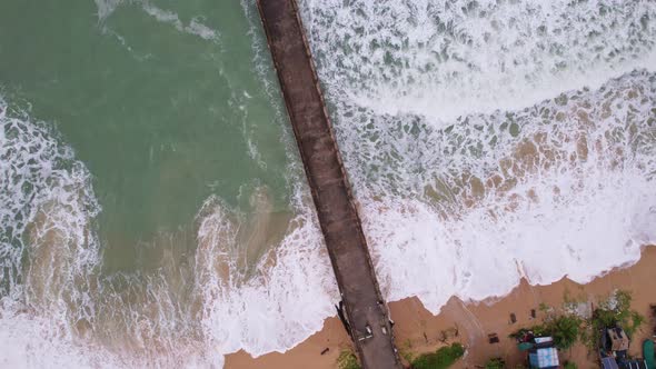 Amazing small bridge in to the summer sea High angle view Beautiful sea surface in sunny day