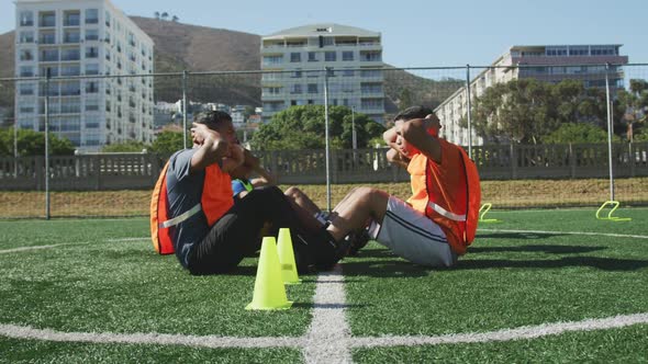 Soccer players training on field