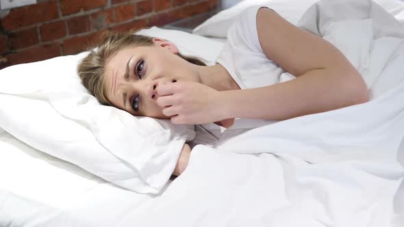 Uncomfortable Woman Sleeping in Bed at Night Restlessness