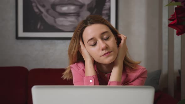 Close Up Tired Sad Businesswoman Face Looking at Laptop at the Home Office