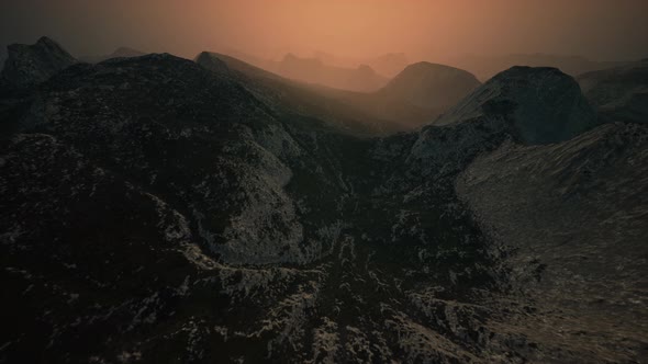 Dramatic Sky Over Rocky Mountains at Sunset