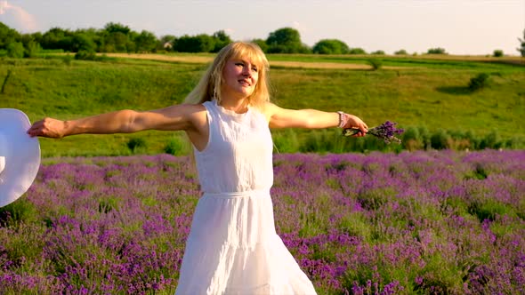 Woman in Lavender Field in Summer