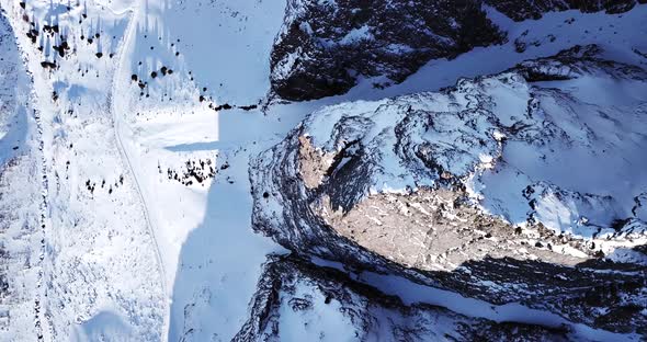 Huge Rocks Covered with Snow