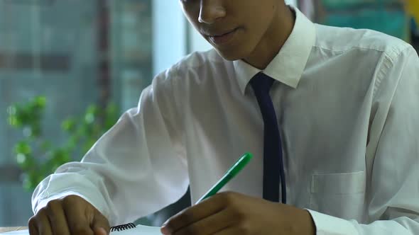 Puzzled Schoolboy Thinking Over Complicated Test in Classes, Unprepared for Exam