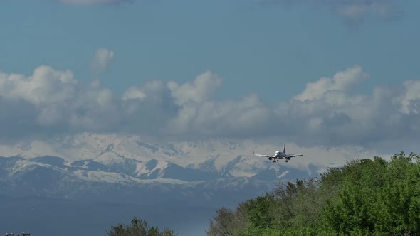 Twin Engine Airplane Approaching to Landing