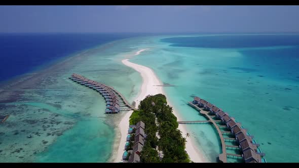 Aerial top down landscape of perfect coast beach adventure by clear sea and clean sandy background o