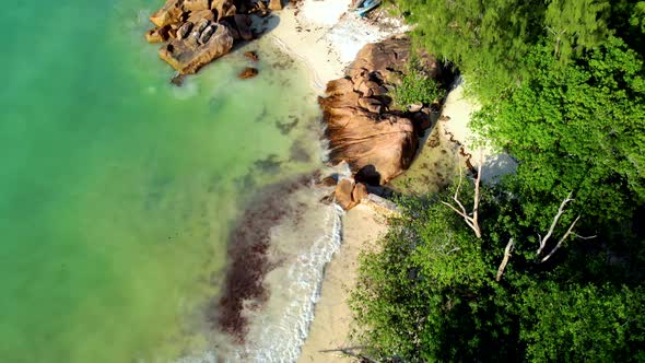 Anse Patates La Digue Seychelles Young Couple Men and Woman on a Tropical Beach During a Luxury