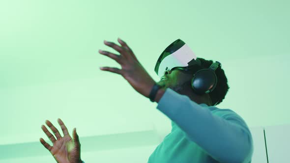 Man Wearing Virtual Reality Glasses and Enjoying the 360 Degree Virtual Environment