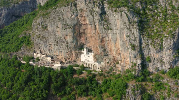 Aerial View on the Monastery of Ostrog Situated Vertical Rocky Mountain