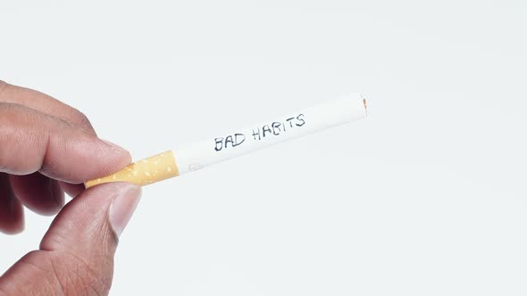 Hold Cigarette With Writing Bad Habits