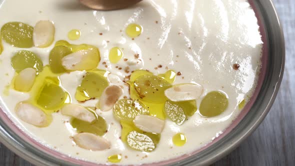 Spanish cold soup ajo blanco from garlic, almonds, wine vinegar, oil and grapes