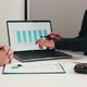 Businessmen explain about quarterly results on laptop screen with colleagues and entrepreneurs - VideoHive Item for Sale