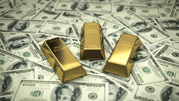 Fine Gold Bars upon USD Bills