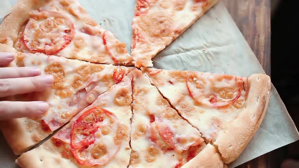 People Hands Taking Slices Of Pizza Margherita