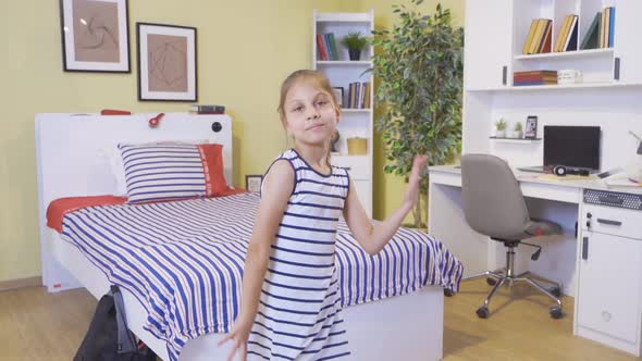 The two children are jumping around the room and they are happy.