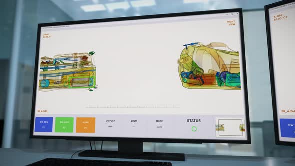 Airport Security check system has identified a dangerous pistol in the bag alt