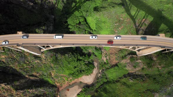  of Vehicles Driving By the Picturesque Big Sur Bridge Over the Canyon