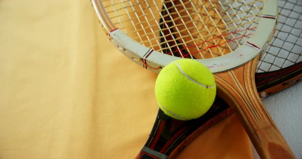 Tennis ball and racket on white background 4k