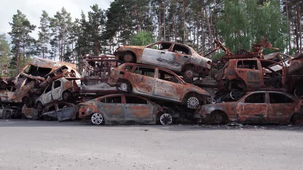 War in Ukraine a Dump of Shot and Burned Cars in Irpin Bucha District