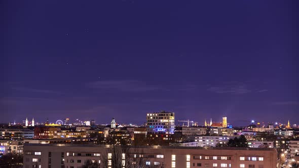 Time lapse of the Munich skyline at night.