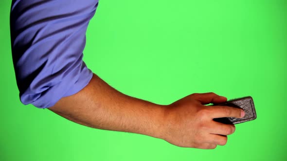 An arm in front of a green screen to be keyed and used at will. Rotate image for best results. Origi