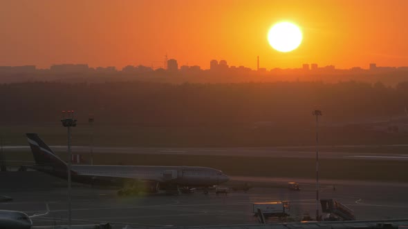 Sunset over city and airport view. Moscow, Russia