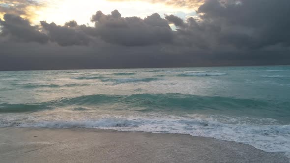 Cascading Waves Crashing On Beach Shore Beautiful Morning Sunrise Tropical Scenic View