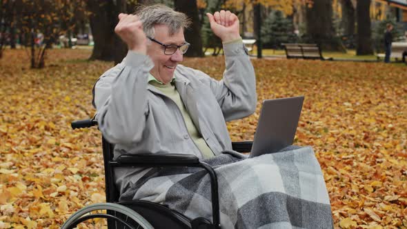 Happy Senior Caucasian Elder Male Pensioner Grandfather Sit Alone on Wheelchair Mature Grayhaired