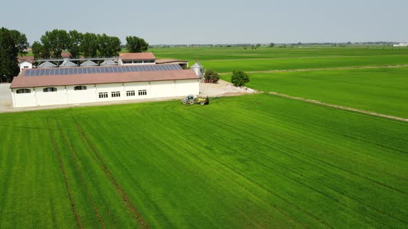 Tractor Spraying Pest Fertilizer, Herbicide, Pesticide on Agriculture Farm Field