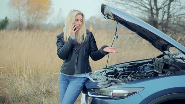 Woman Repairing Accident Car. Sad Disappointed Woman On Broken Car. Car Insurance Service Calling.