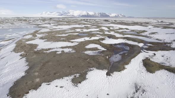 Winter landscape in Iceland, frozen lake and mountains