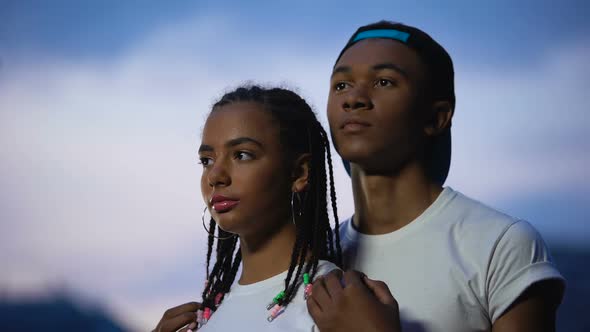 Loving African Couple Hugging, Closing Eyes to Dream About Happy Future Together