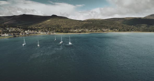 Scotland's Bay Aerial: Yachts, Sailboats at Ocean View in Water Seascape of Brodick. Ships and Boats