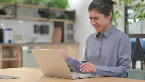 Young Indian Woman Feeling Frustrated While Using Laptop