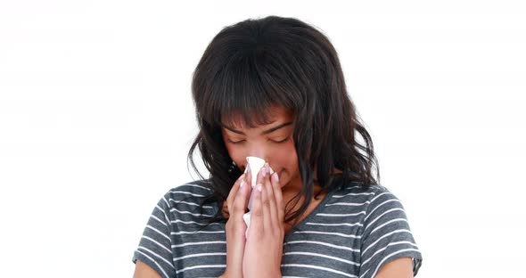 Woman Blowing Nose with Tissue Paper