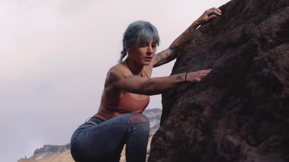 Rock Climber Girl With Blue Hair And Tattoos