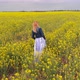 Girl Walks Across The Field - VideoHive Item for Sale