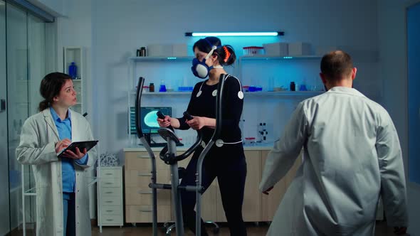 Researchers Monitoring Vo2 of Woman Performance Sports