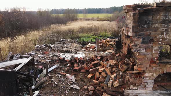 A Burntout Rural House with a Brick Oven Aerial View