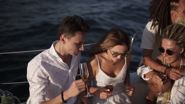 High Angle View of 4 Friends or Couples Spend a Weekend on a Yacht