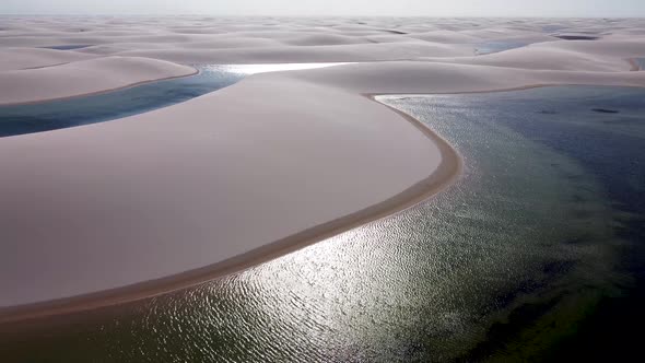 Sand dunes and rain water lagoons at northeast brazilian paradise