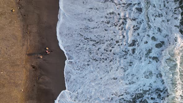 A Man Searches for Gold After a Storm Aerial View 4 K Turkey Alanya